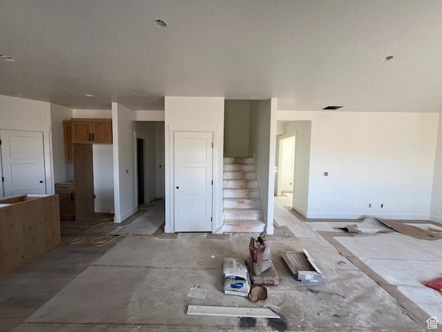 1155 E 1150 S, Garland, UT 84312 - unfurnished living room with stairway