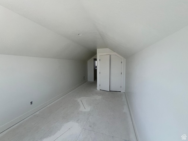 1155 E 1150 S, Garland, UT 84312 - additional living space featuring vaulted ceiling and baseboards