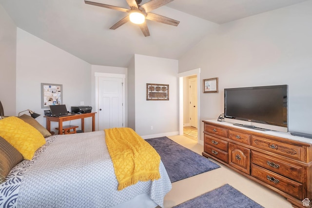bedroom with baseboards, vaulted ceiling, a ceiling fan, and light colored carpet