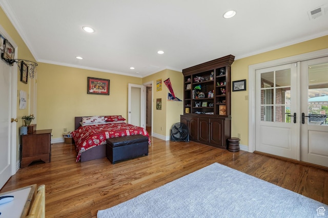 1230 E 11th Ave N, Salt Lake City, UT 84103 - bedroom with french doors, wood finished floors, recessed lighting, crown molding, and access to exterior