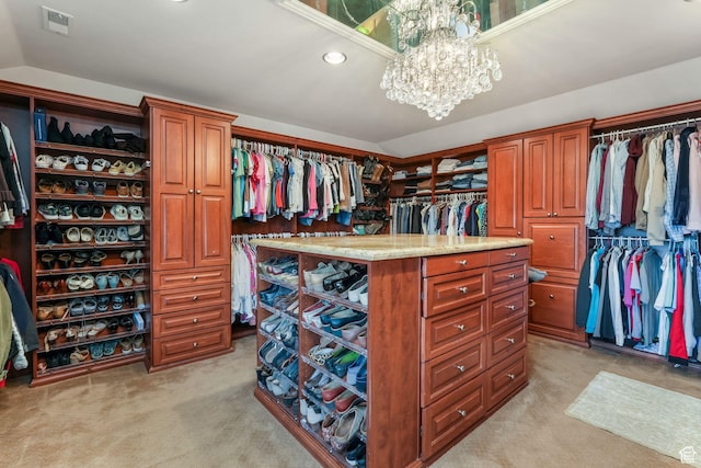 1230 E 11th Ave N, Salt Lake City, UT 84103 - spacious closet with light carpet, visible vents, and an inviting chandelier
