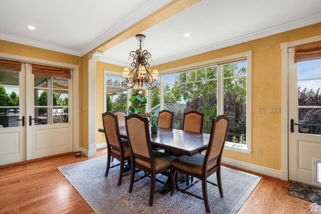 1230 E 11th Ave N, Salt Lake City, UT 84103 - dining space featuring a chandelier, crown molding, light wood-type flooring, and recessed lighting