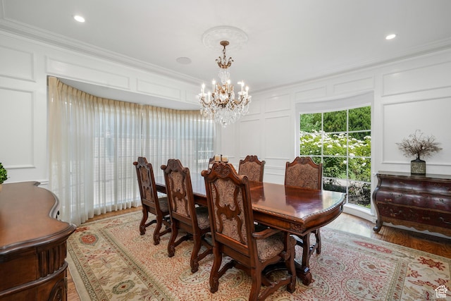 1230 E 11th Ave N, Salt Lake City, UT 84103 - dining area with a decorative wall, a chandelier, crown molding, light wood-style floors, and recessed lighting