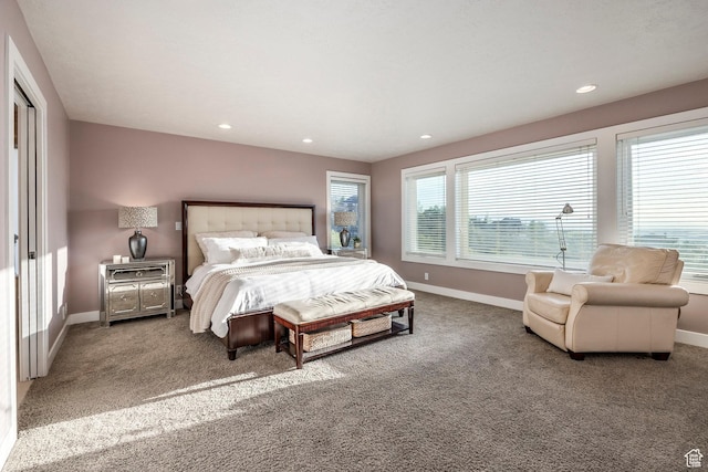 bedroom with recessed lighting, carpet flooring, and baseboards
