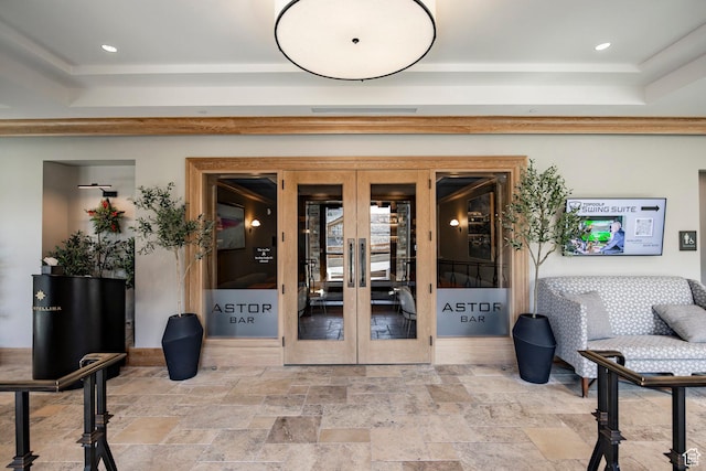 entrance to property featuring french doors