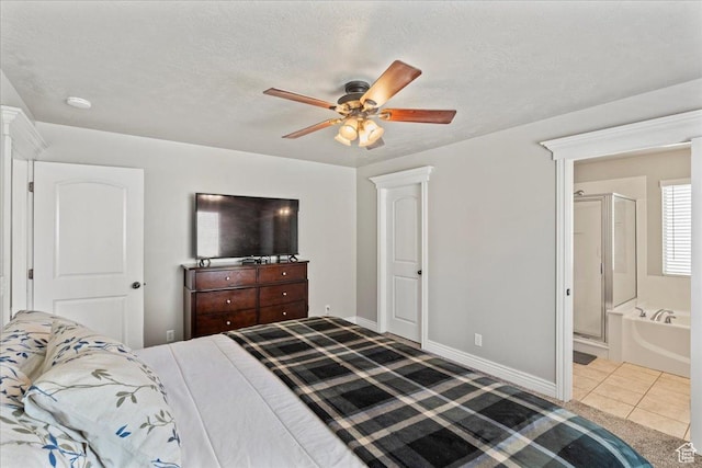 7134 S Rialto Way, West Jordan, UT 84081 - tiled bedroom featuring baseboards, ceiling fan, and ensuite bathroom
