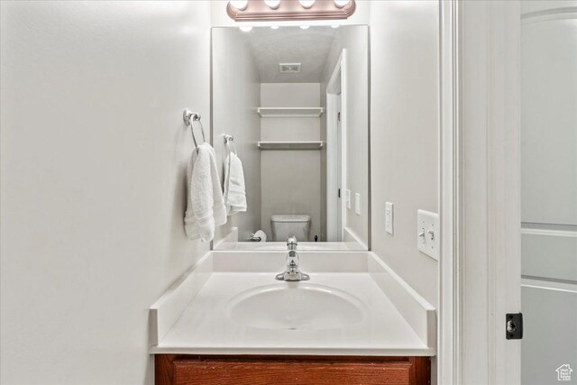 7134 S Rialto Way, West Jordan, UT 84081 - bathroom with toilet and vanity