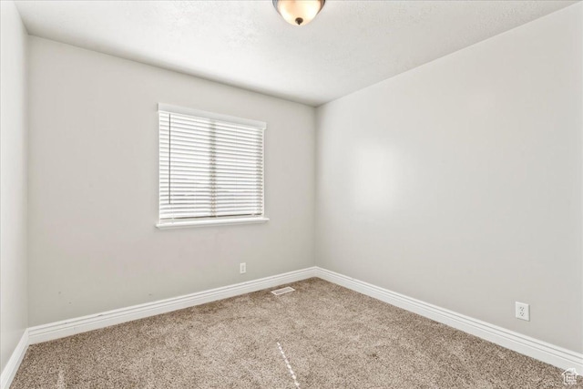 7134 S Rialto Way, West Jordan, UT 84081 - carpeted empty room with baseboards