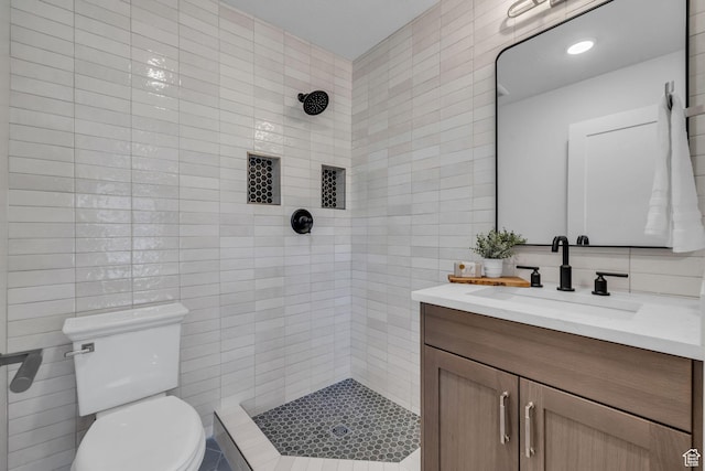1338 S 1220 E, Salem, UT 84653 - bathroom with a tile shower, toilet, vanity, and tile walls