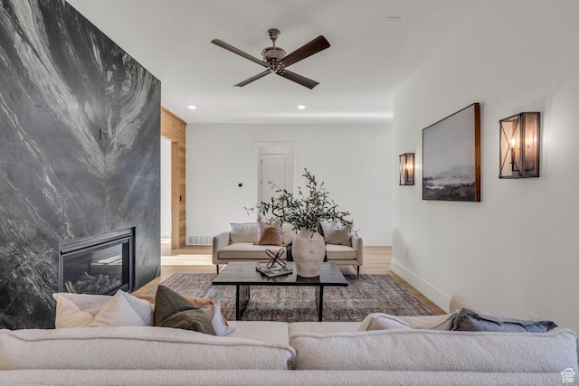 1338 S 1220 E, Salem, UT 84653 - living area with recessed lighting, wood finished floors, a ceiling fan, a premium fireplace, and baseboards