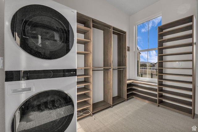1338 S 1220 E, Salem, UT 84653 - laundry area with stacked washer / dryer, laundry area, and light colored carpet