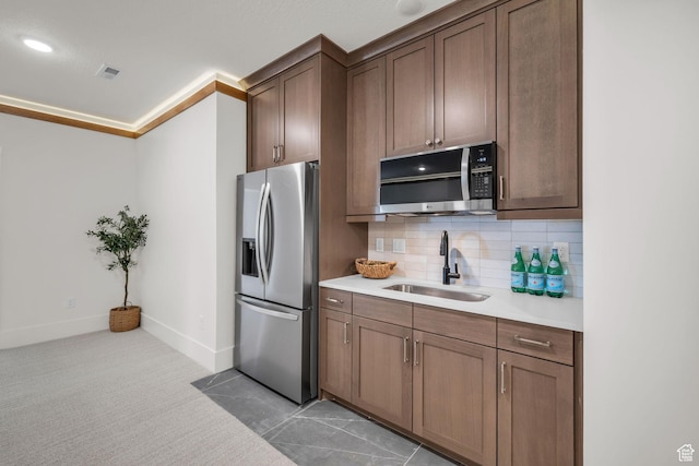 1338 S 1220 E, Salem, UT 84653 - kitchen with a sink, decorative backsplash, light countertops, baseboards, and appliances with stainless steel finishes