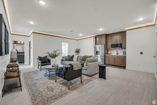 1338 S 1220 E, Salem, UT 84653 - living area with recessed lighting, baseboards, crown molding, and light colored carpet