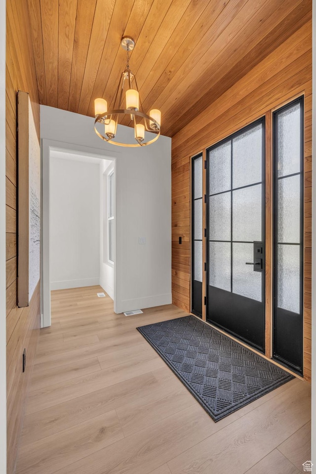 1338 S 1220 E, Salem, UT 84653 - entrance foyer featuring light wood finished floors, baseboards, a chandelier, wood ceiling, and wooden walls