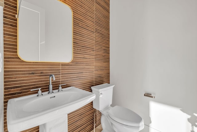 1338 S 1220 E, Salem, UT 84653 - half bath with tasteful backsplash, tile walls, toilet, and a sink