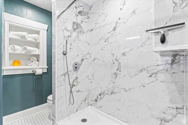 full bathroom with tile patterned floors, a marble finish shower, and toilet