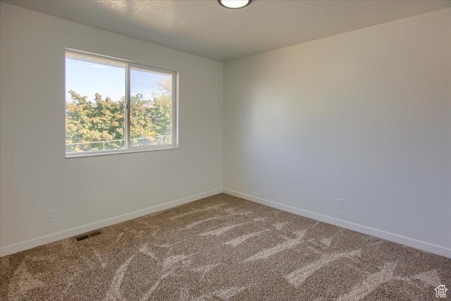 1166 E 4875 S, Ogden, UT 84403 - empty room featuring visible vents, carpet flooring, and baseboards