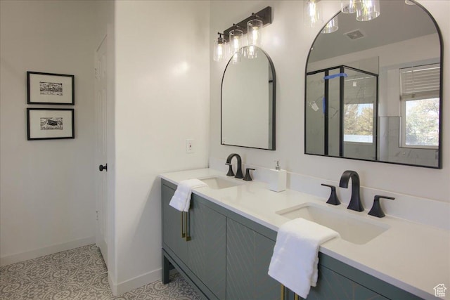 1166 E 4875 S, Ogden, UT 84403 - bathroom featuring baseboards, a sink, a shower stall, and double vanity