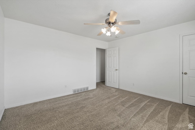 325 E 2300 N, North Ogden, UT 84414 - carpeted spare room with visible vents, a ceiling fan, and baseboards
