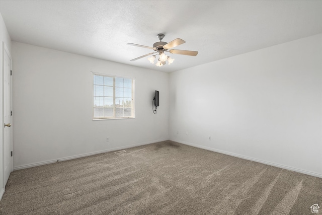 325 E 2300 N, North Ogden, UT 84414 - carpeted spare room featuring baseboards and a ceiling fan