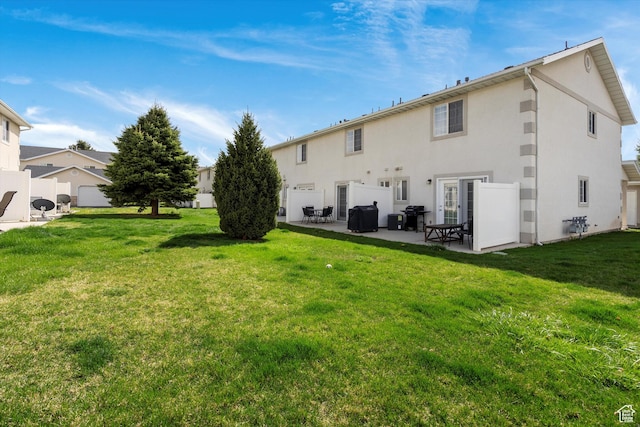 325 E 2300 N, North Ogden, UT 84414 - rear view of house featuring a patio area, a lawn, central AC unit, and stucco siding