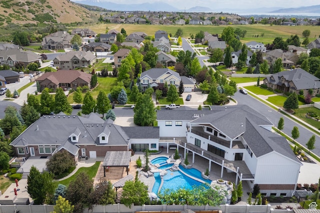 1263 E Chapman Ct, Alpine, UT 84004 - aerial perspective of suburban area with a pool and a mountainous background
