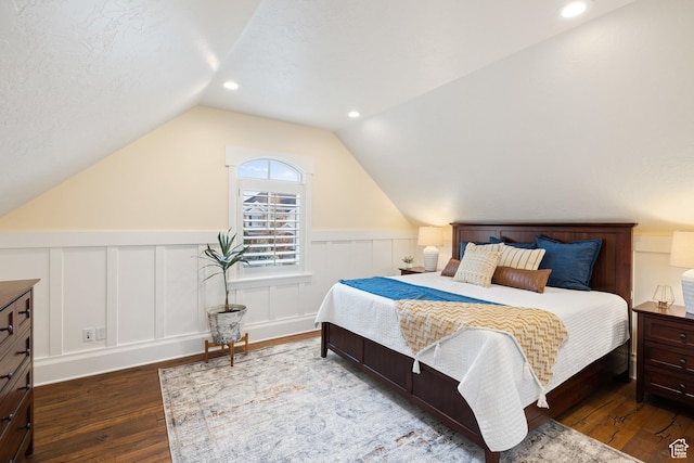 1263 E Chapman Ct, Alpine, UT 84004 - bedroom featuring wood finished floors, lofted ceiling, wainscoting, and a decorative wall