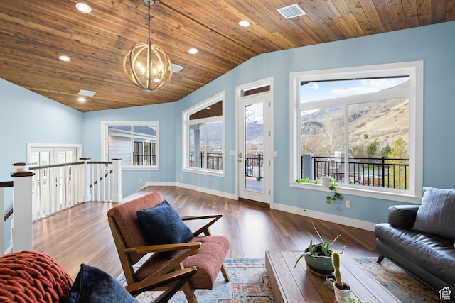 1263 E Chapman Ct, Alpine, UT 84004 - living area with healthy amount of natural light, vaulted ceiling, a chandelier, recessed lighting, and wood finished floors