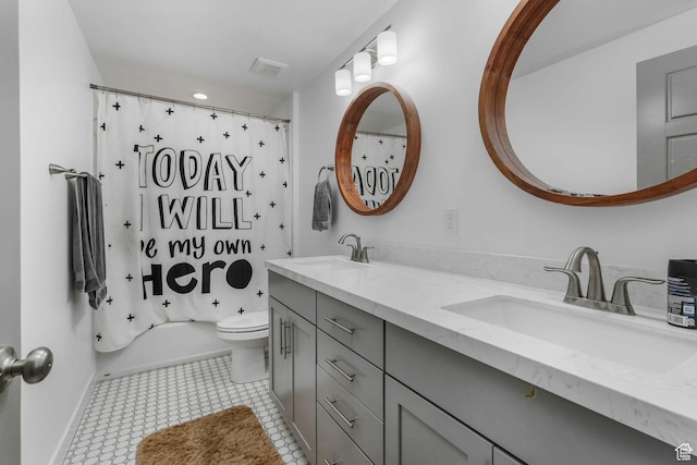 14 E 2300 S, Kaysville, UT 84037 - bathroom with double vanity, toilet, baseboards, tile patterned flooring, and shower / bath combo