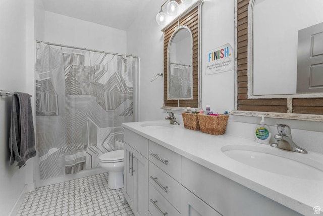 14 E 2300 S, Kaysville, UT 84037 - full bath with toilet, double vanity, tile patterned floors, and shower / bath combination with curtain