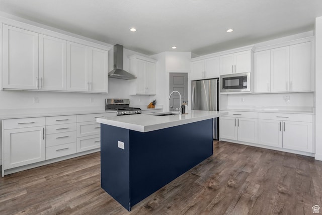 14 E 2300 S, Kaysville, UT 84037 - kitchen with wall chimney exhaust hood, stainless steel appliances, a sink, dark wood-style flooring, and white cabinetry