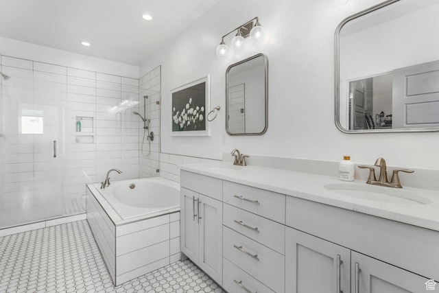 14 E 2300 S, Kaysville, UT 84037 - bathroom with double vanity, a stall shower, a bath, and recessed lighting