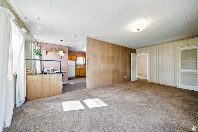 808 E 3685 S, Millcreek, UT 84106 - unfurnished living room featuring wooden walls and carpet
