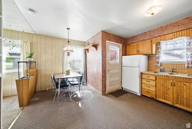 808 E 3685 S, Millcreek, UT 84106 - kitchen featuring freestanding refrigerator, dark carpet, and a sink