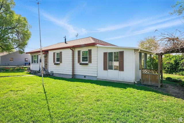 808 E 3685 S, Millcreek, UT 84106 - back of property with a lawn and a shingled roof