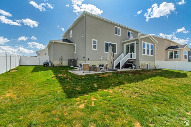back of house with a fenced backyard, central air condition unit, stucco siding, a patio, and an outdoor living space