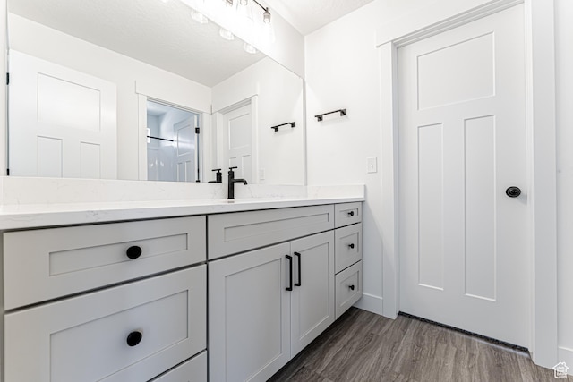 3677 W 950 N Unit 219, Lehi, UT 84043 - bathroom featuring vanity and wood finished floors