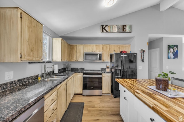 1282 S 875 W, Woods Cross, UT 84087 - kitchen featuring light wood finished floors, stainless steel appliances, a sink, light brown cabinets, and wooden counters