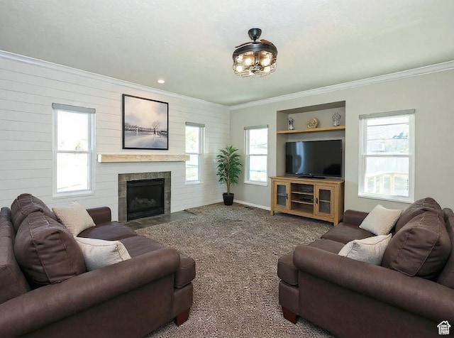 12261 S Stephens View Cir, Draper, UT 84020 - carpeted living room featuring ornamental molding, plenty of natural light, a tile fireplace, and wood walls