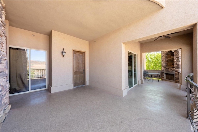 188 N 6680 W Unit 4, Hurricane, UT 84737 - view of patio / terrace featuring an outdoor stone fireplace
