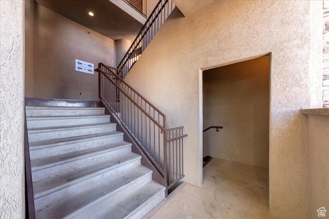 188 N 6680 W Unit 4, Hurricane, UT 84737 - stairs with concrete flooring and a textured wall