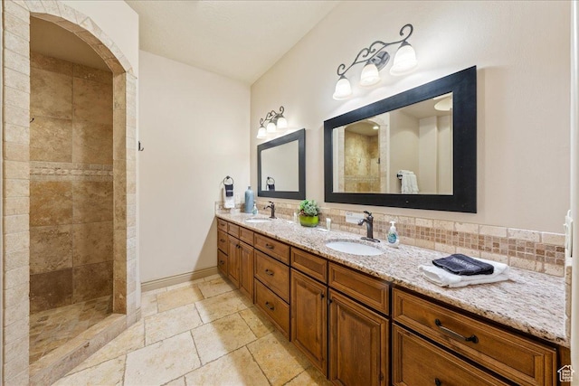 188 N 6680 W Unit 4, Hurricane, UT 84737 - full bath featuring a tile shower, stone tile flooring, a sink, and double vanity