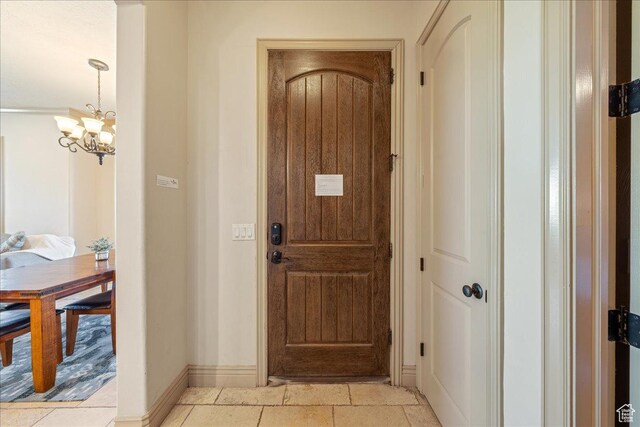 188 N 6680 W Unit 4, Hurricane, UT 84737 - entryway with baseboards and an inviting chandelier