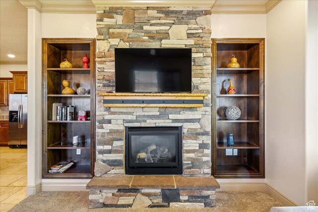 188 N 6680 W Unit 4, Hurricane, UT 84737 - tiled living room with crown molding and a stone fireplace