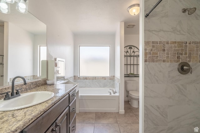 1024 Painted Cloud Pl, Washington, UT 84780 - full bathroom featuring tile patterned flooring, a tile shower, toilet, and vanity