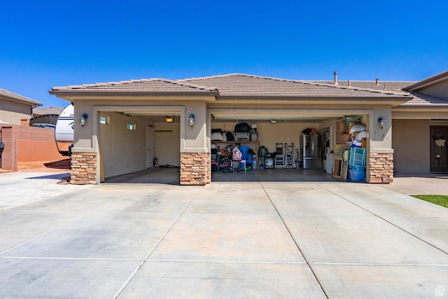 1024 Painted Cloud Pl, Washington, UT 84780 - prairie-style home with stucco siding, driveway, and stone siding