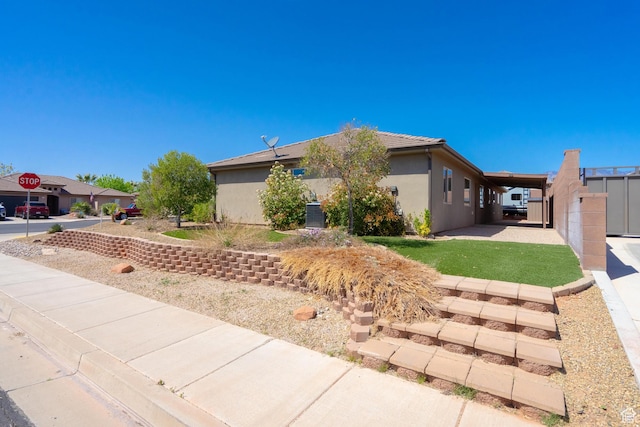 1024 Painted Cloud Pl, Washington, UT 84780 - view of front of property with stucco siding