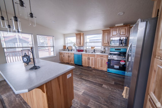 163 Eagle St, Eureka, UT 84628 - kitchen featuring a sink, light countertops, lofted ceiling, appliances with stainless steel finishes, and dark wood-type flooring