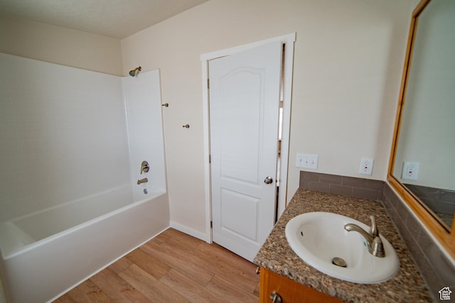 163 Eagle St, Eureka, UT 84628 - full bath featuring washtub / shower combination, wood finished floors, and vanity