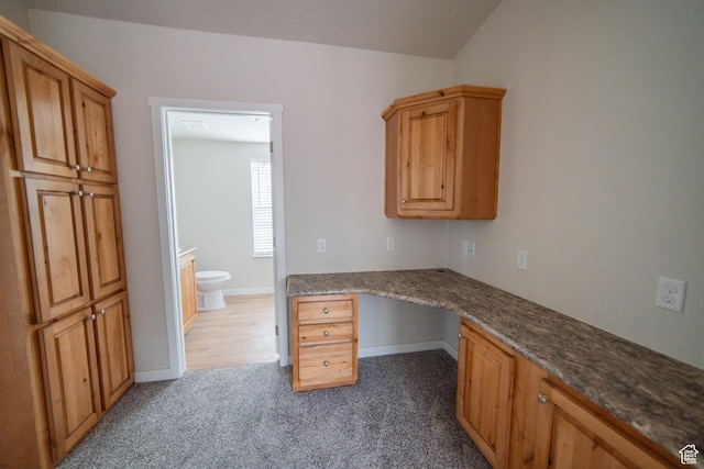 163 Eagle St, Eureka, UT 84628 - unfurnished office with baseboards, carpet flooring, and built in desk